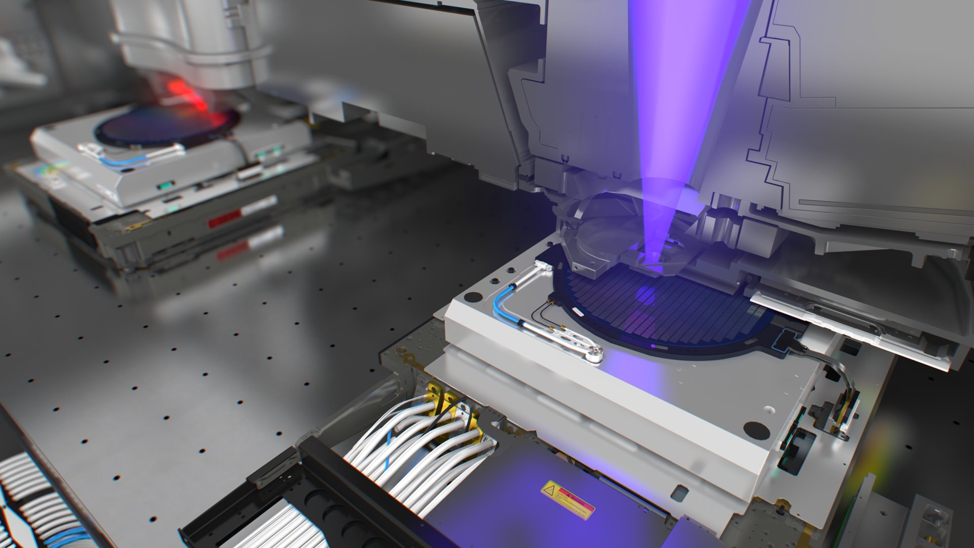 A wafer is exposed inside an ASML EUV lithography machine A wafer is exposed inside an ASML EUV lithography machine